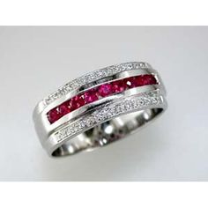 Illuminate your identity with the intrigue of Royal 14K White Gold Ruby & Diamond Ring - 0.50 Carat Ruby, 0.14 Carat Diamond Total Luxury Ruby Jewelry Channel Set, Luxury Ruby Channel Set Jewelry, Formal Ruby Ring With Diamond Accents, Baguette Cut, Modern White Gold Ruby Ring For Anniversary, White Gold Ruby Ring With Baguette Cut, Timeless Diamond Ruby Ring For Anniversary, White Gold Ruby Baguette Cut Ring, Timeless Diamond Ruby Anniversary Ring, Formal Diamond White Ruby Ring