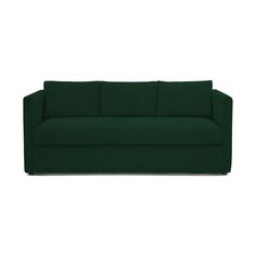 a green couch sitting on top of a white floor