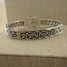 Sterling Silver Flat Dragon Weave Bracelet with Celtic Knot | Etsy Celtic Knot Wedding Ring, Bedknobs And Broomsticks, Weave Bracelet, Celtic Knot Ring, Celtic Knots, Jewelry Bracelets Silver, Silver Flats, Girl Jewelry, Woven Bracelets