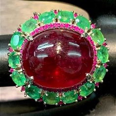 Aphrodite is the goddess of love. Gorgeous 925 sterling silver ring, 14 carat gold.  Main stone: magnificent natural ruby place of birth -- Miami, 16.0 x 14.0 mm. Additional stone: magnificent natural Brazilian emerald of classic diamond cut 3.0x4.0 mm.  Weight: product 10.1 g. American size 8.  Cost: 370 euros. Ruby Cabochon Ring, Goddess Of Love, The Goddess, Jewelry Ring, Natural Ruby, Rings For Her, Aphrodite, 925 Sterling Silver Ring, Band Rings