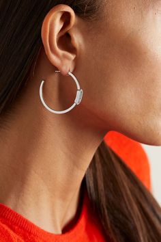 The small iteration of Messika's 'Move Uno' hoop earrings are designed in a slim, jaw-grazing shape. They're handmade from 18-karat white gold and have a central diamond that glides freely within a pavé-set oblong. We also have the rose and yellow gold versions in our edit. Messika Move Uno, Rhinestone Hoop Earrings, Roxanne Assoulin, Gold Diamond Hoop Earrings, Fashion Jewelry Earrings, Diamond Hoop Earrings, White Enamel, Full Moon, White Gold Diamonds