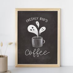 a coffee cup with two spoons sticking out of it and the words freshly bood in