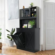 Upgrade your kitchen with Arlopu high-quality trash cabinet. Made with polished MDF wood, it's durable and easy to clean. It's not only a trash cabinet, but also a great kitchen storage cabinet with a spacious countertop and 2 pull-out drawers, storage shelves above the tabletop, providing enough space for small kitchen appliances and supplies, keep them clean and tidy. Arlopu Tilt out trash cabinet is not just for garbage cans. It can also hold laundry baskets, pet food bins, and more. The hidd Tilt Out Trash Cabinet, Cabinet Trash, Garbage Can Storage, Trash Cabinet, Trash Storage, Trash Can Cabinet, Laundry Sorting, Pantry Storage Cabinet, Kitchen Trash