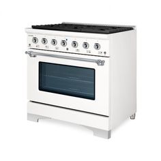 a white stove top oven sitting inside of a kitchen