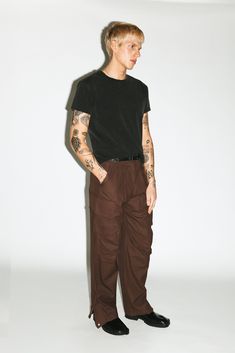 A utility cargo for the ultimate off-duty uniform. Easy-going and relaxed, these cargos are pleated for a slightly wider, straight-leg silhouette. Open the side-zip hems for a sportier 90's aesthetic. Dress down formal blazers and button-ups with an effortless, casual contrast. Utility Style Cargo Pants With Straight Hem, Casual Cargo Pants With Straight Hem, Relaxed Fit Brown Cargo Pants, Relaxed Fit Cargo Pants For Elevated Casual, Brown Utility Parachute Pants With Belt Loops, Utility Cargo Pants With Straight Hem, Streetwear Relaxed Fit Cargo Pants With Straight Hem, Elevated Casual Utility Cargo Pants With Tapered Leg, Brown Relaxed Fit Cargo Jeans For Streetwear