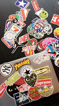 many different stickers are on the table