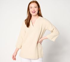 Simple-yet-stylish, this gauzy cotton top will be a mainstay in your summer wardrobe. Bell-shaped sleeves add dimension and create light and airy movement, while frayed edges give this tunic an undone, cool-and-carefree appeal. From Belle Beach by Kim Gravel. Cotton Beach Tops With 3/4 Sleeves, Spring Cotton V-neck Tunic, Cotton Tops For Beach With 3/4 Sleeves, Summer Cotton Tunic For Spring, Cotton Split Neck Top For Summer, Linen Split Neck Top For Summer, Split Neck Linen Top For Summer, Cotton Tunic For Day Out With Relaxed Fit, Cotton Tunic With Relaxed Fit For Day Out