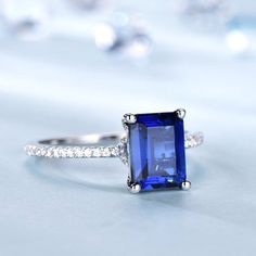 You are looking at a vintage Lab-Created Blue Sapphire Engagement Ring. A perfect anniversary gift, birthday gift,wedding engagement ring.Great as a gift for her.Ring Information<><><><><><><><><><><><><><><>Main Stone*Lab-Created Blue Sapphire*6x8mm blue sapphire*Weight:it's approx 1.5 ctw.*Setting:4-prongStone On the Band*SI Clarity and H Color real diamond.Metal* Solid 10k 14k &18k.*Color:white gold,yellow gold,rose gold.Custom Order<><><><><><><><><><><><><><><>*The main stone can be other g Saphire Engament Ring Square, Rectangular Sapphire Ring With Prong Setting As Gift, Classic Radiant Cut Sapphire Ring For Anniversary, Rectangular Sapphire Birthstone Ring For Anniversary, Rectangular Sapphire Rings For Gifts, Rectangular Sapphire Ring As Gift, Emerald Cut Sapphire Birthstone Ring Gift, Sapphire Birthstone Ring Emerald Cut Gift, Rectangular Birthstone Ring With Prong Setting For Anniversary