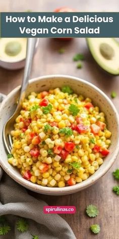 a bowl filled with corn and garnish next to sliced avocado on the side