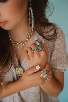 Shop our collection of real gemstone rings, necklaces, earrings and bracelets! From big Indian rings, to stunning bangles, we have it all!  Featured here is the Betta Larimar Turquoise Ring. Beautiful Larimar turquoise stone set into a unique turquoise setting. Measures 1.25 inch tall.  big rings indian. big rings boho. big rings fashion. big rings for women. big rings indian