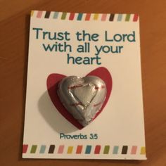 a card with a heart on it that says trust the lord with all your heart