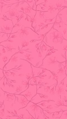 a pink wallpaper with branches and flowers on it