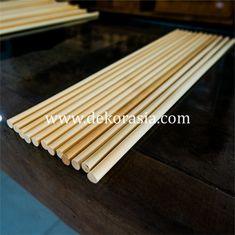 bamboo sticks are lined up on a table