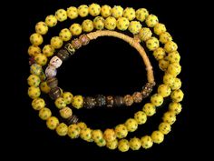 "Venetian antique African trade raised eye beads, yellow with green raised eyes. Long strand, beautifully matched and very rare with a few wedding cake beads. Wear as is or used in your own designs. 34\" strand, 12 mm beads (# 371)" African Trade Beads, Eye Beads, African Beads, Trade Beads, Colourful Necklace, Very Rare, Wedding Cake, Wedding Cakes, Beaded Necklace