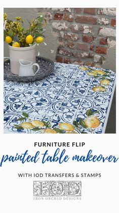 a blue and white table with yellow flowers on it