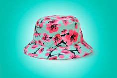 Let your love for summer bloom with our AZ Blossom Bucket Hat. Perfect for protecting you for a hot summer day at the beach while keeping your style completely intact! Trendy Flat Brim Bucket Hat For Vacation, Trendy Short Brim Bucket Hat For Beach Season, Pink Bucket Hat For Beach Vacation, Spring Vacation Bucket Hat With Flat Brim, Pink Summer Vacation Bucket Hat, Pink Summer Bucket Hat For Vacation, Pink Bucket Hat For Summer Vacation, Pink Brimmed Bucket Hat For Vacation, Fun Summer Bucket Hat With Curved Brim