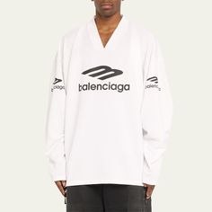 Balenciaga jersey ski shirt with reflective effect artwork Designed to be worn over outerwear pieces V-Neck 3B sports icon artwork printed at front, back and sleeves Long sleeves Pullover style Polyester Dry clean Made in Portugal Long Sleeve Logo Tops For Streetwear, Long Sleeve Tops With Logo For Streetwear, Long Sleeve Tops With Logo Detail For Streetwear, Long Sleeve Logo Tops In Athleisure Style, Athleisure Long Sleeve Tops With Logo, Sporty Long Sleeve Tops With Logo Detail, Long Sleeve T-shirt With Logo For Streetwear, Sporty V-neck Sweatshirt For Streetwear, Sporty Long Sleeve Tops With Logo