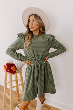 - Step out in charm with this darling mini dress! Featuring ruffled shoulders and a cinched waistline, it's perfect for effortless everyday elegance. - Unlined, ultra-soft material with a brown, blue, and green hued striped pattern - A crew cut neckline - Long sleeves with ruffled shoulder details - A functional drawstring to cinch the waist - Hidden side pockets - A relaxed yet flattering silhouette that ends in a straight mini dress length hemline Green Ruffled Mini Dress For Fall, Fall Khaki Mini Dress, Chic Green Mini Dress With Ruffle Sleeves, Casual Ruffle Sleeve Mini Dress For Fall, Casual Mini Dress With Ruffle Sleeves For Fall, Fall Mini Dress With Ruffle Sleeves, September Fashion, Concert Fashion, Everyday Elegance