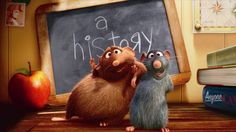 two mice standing next to each other in front of a chalkboard