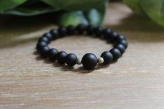 Gorgeous beaded bracelet stacks. These stacks are so elegant and made with beautiful beads and charm. Great to wear it by itself or stack it with other bracelets or bangles. Let Sassy Daisy add the finishing touches to your outfit! - Bracelet Stacks - Black Matte Onyx Agate Gemstone  - Beaded stacks fits 6.5-7.5 inch wristlets on average - One size fits all (fits most wrists; not recommended for small wrists.) - Each piece may vary in color, size, shape, and contain natural inclusions. Every pie Bracelet Stacks, Handmade Bracelet, Black Matte, Silver Accents, May 31, Agate Gemstone, Bracelet Stack, Black Beads, Handmade Bracelets