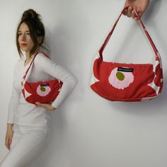 Finnish MARIMEKKO Unikko Vintage floral cottonBag, Made in Finland Poppy print Baguette Bag, Red Canvas Shoulder Bag, Small Floral Handbag, Finnish Design Model in the photos is size 8UK/4US; 164 cm/5'5'' Measurements, flat / approximate measurements: in inches and cm., please check the pictures. Very Good Vintage Condition: light marks / spots. Look at all the photos for a more detailed description. It's a Finnish vintage piece - please do not expect perfect-like new condition (unless it's stat Red Fabric Shoulder Bag For Shopping, Rectangular Cotton Shoulder Bag With Floral Print, Rectangular Cotton Floral Print Shoulder Bag, Red Fabric Bag For Everyday Use, Red Cotton Shoulder Bag For Daily Use, Red Fabric Shoulder Bag For Daily Use, Red Floral Print Tote Bag, Red Cotton Pouch Bag, Red Rectangular Cotton Shoulder Bag