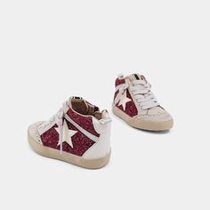 Check out PAULINA! These hi-top sneakers offer a twist on classic basketball shoes with unique color and texture combos. Match your little one's outfit with our Mommy and Me collectionglittery body, faux leather and suede embellishments, durable rubber sole - perfect for both. Glitter Sneakers, Loafer Mules, Hi Top, Red Glitter, Sneaker Heels, Boot Sandals, Mule Clogs, Mommy And Me, Unique Colors