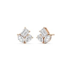 Count on these diamond trio earrings to make any outfit look trendy and timeless at once. Each earring features a cluster of diamonds in pear, marquise, and emerald cuts. The earrings also exude a modern-classic vibe perfect for mixing and matching. Small Earrings Diamonds, Earrings To Make, Art Jewelry Design, Diamond Cluster Earrings, Classic Vibe, Diamond Jewelry Necklace, Gorgeous Engagement Ring, Diamond Jewelry Designs, Gold Diamond Earrings