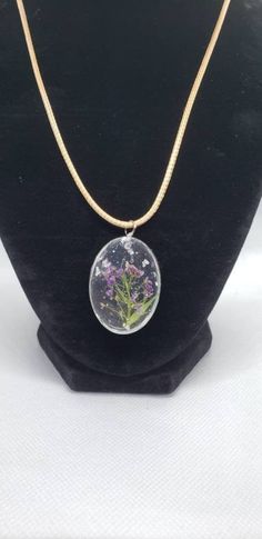 "This piece is a resin flower pendant on an 18\" adjustable corded necklace with a lobster clasp. The first step in creating any resin piece is to pick out the right products. These flowers were picked for their deep color and form.  Then the flowers are trimmed to fit the piece.  The flower is then cast in a hard resin.  The beauty of the flower will continue to provide color and visions of summer even in the cold wet snowy winters.  Once resin sets then the process of sanding and polishing com Corded Necklace, Star Mold, Beauty In Everything, Necklace For Mom, Clear Nail Polish, Women Necklace, Resin Necklace, Resin Flowers, Deep Colors