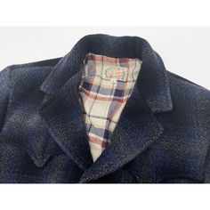 SPECS Shell: Heavy 21.25 Oz. soft-hand wool fabric, shadow plaid with dominant black/blue/grey. Milled in Japan.Lining: 100% cotton woven plaid heavy flannel, natural/navy/red dominant. Milled in Japan. * An original pattern inspired by vintage westernwear jackets designed for the 1950s-60s urban cowboy.* Deconstructed silhouette.* High lapel roll.* Western arcuate yoke on front/back top block.* Swing-back expansion pleats construction.* Scalloped pocket flaps with plaid flannel facing accents.* Plaid Wool Sport Coat With Patch Pockets, Tailored Plaid Outerwear With Patch Pockets, Plaid Wool Tweed Jacket With Patch Pockets, Plaid Wool Blazer With Patch Pockets, Plaid Wool Sport Coat With Lapel Collar, Wool Plaid Sport Coat With Welt Pockets, Plaid Wool Sport Coat With Welt Pockets, Fitted Plaid Outerwear With Patch Pockets, Blue Wool Coat With Lapel Collar