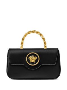 Versace La Medusa Foldover Shoulder Bag - Farfetch Gold Bag With Gold-tone Logo Plaque And Double Handle, Gold Top Handle Shoulder Bag With Gold-tone Logo, Luxury Double Handle Shoulder Bag With Gold-tone Logo Plaque, Evening Shoulder Bag With Gold-tone Logo And Double Handle, Classic Evening Flap Bag With Logo Hardware, Chic Evening Flap Bag With Logo Hardware, Chic Rectangular Flap Bag With Logo Hardware, Elegant Formal Flap Bag With Logo Hardware, Gold Crossbody Flap Bag With Gold-tone Logo Plaque