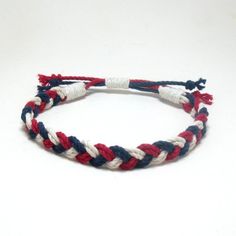 Support your red, white, and blue with this patriotic inspired anklet. Also made to coordinate with our original sailor bracelets in patriotic colors.This anklet is fully adjustable and should fit most ankles, opening up to about 13 inches and is a little less than 1/2 inch wide. Made out of braided cotton cord with the ends whipped in a narrower cotton cord.This represents three generations of craftsmanship on the coast of Connecticut creating the finest sailor bracelet on the market today. Enj Adjustable Patriotic Friendship Bracelets For 4th Of July, Patriotic Adjustable Friendship Bracelets, Casual Multicolor Bracelets For 4th Of July, Casual Blue Bracelets For 4th Of July, Affordable Patriotic Friendship Bracelets, Navy Adjustable Casual Bracelets, Adjustable Patriotic Friendship Bracelets, Handmade Adjustable Patriotic Bracelets, Handmade Adjustable Patriotic Bracelet