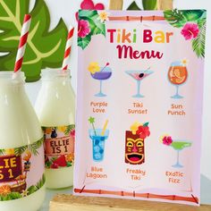 there is a sign that says tiki bar menu next to two bottles with drinks in them