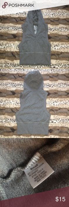 Cotton sleeveless hoodie This gray cotton sleeveless hoodie is unworn and needs a new home. G by Guess Tops Sweatshirts & Hoodies Gray Cotton Workout Vest, Stretch Cotton Athleisure Vest, Sleeveless Tops For Fall Streetwear, Sleeveless Streetwear Tops For Fall, Fall Streetwear Sleeveless Tank Top, Casual Hooded Workout Vest, Sporty Sleeveless Hoodie For Spring, Cotton Athleisure Vest For Spring, Spring Cotton Vest For Athleisure