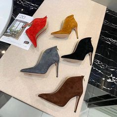 Rock vibes for these suede booties. Zip-up fastening on the back. fully lined iron stiletto. Nappa footbed. Genuine leather sole. Heel: 100 mm.[custom tab]UPPER #1: 100% SUEDE LEATHER | LINING #1: 100% SHEEP LEATHER | OUTSOLE #1: 100% COW LEATHER[/custom tab] Chic Suede Heeled Boots With 4-inch Heel, Chic 4-inch Heel Suede Boots, Chic 4-inch Heeled Suede Boots, Chic Suede Heeled Boots, Suede High Ankle Heeled Boots For Party, Trendy High Ankle Suede Heels, Suede High Heel Boots With Sculpted Heel, Suede Boots With Sculpted High Heel, Party Heels With Suede Lining For Fall