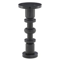 a tall black table with three small round bases on each side and two smaller ones at the top