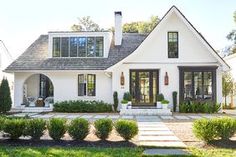 a large white house with lots of windows