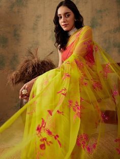 Yellow net sareeHas floral sequin embroidered detailThe saree comes with an unstitched blouse piece The blouse worn by the model might be for modelling purpose only. Check the image of the blouse piece to understand how the actual blouse piece looks like. Bollywood Unstitched Organza Blouse Piece, Unstitched Bollywood Blouse Piece In Organza, Bollywood Style Unstitched Organza Blouse Piece, Festive Unstitched Organza Blouse Fabric, Festive Organza Embroidered Fabric For Unstitched Blouse, Yellow Blouse Piece With Sheer Dupatta, Semi-stitched Net Pre-draped Saree For Diwali, Sheer Dupatta For Diwali, Diwali Organza Blouse Piece