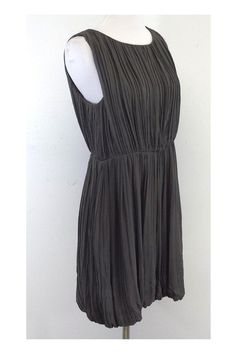 Size 4 Grey Gathered Sleeveless Dress Body 100% Silk Lining 91% Silk 9% Spandex Slips on Gathered waist Bubble hemline Shoulder to Hem 33.25" Pleated A-line Sleeveless Dress For Daywear, Spring Sleeveless A-line Dress With Pleated Back, Sleeveless Fit And Flare Midi Dress With Pleated Bodice, Summer A-line Sleeveless Dress With Pleated Waist, Chic Sleeveless Midi Dress With Fitted Waist, Stretch A-line Pleated Midi Dress, Summer Sleeveless Knee-length Dress With Pleated Bodice, Summer Knee-length Sleeveless Dress With Pleated Bodice, Fitted Sleeveless Pleated Party Dress