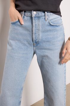 Perfect for everyday wear, these versatile AGOLDE jeans are crafted in structured cotton denim and feature a relaxed, high-rise silhouette with a button fly closure and cuffed hems. Light Wash Straight Hem Bottoms For Work, Classic High Rise Jeans With Button Closure, Classic High-rise Jeans With Button Closure, Classic High Waist Flare Jeans For Everyday, Classic Mom Fit Denim Blue Bottoms, Classic Everyday Mom Fit Bottoms, Classic Mom Fit Bottoms For Everyday, Classic High Rise Flare Jeans With Button Closure, Classic High Waist Flare Jeans