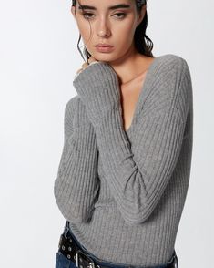 Slim-fitting daytime sweater in ribbed wool- and cashmere-blend yarn with wide neckline at the front. The long sleeves are enhanced by contrasting-colour edging that creates a layered effect, as if one top is being worn over another. The sweater is customised with a PINKO logo-branded label on the back of the neck. Spring Wool Ribbed Tops, Spring Ribbed Wool Tops, Cashmere Knit Top For Layering With Long Sleeves, Chic Fall Knit Top With Ribbing, Ribbed Sweater For Layering, Ribbed Cashmere Sweater For Layering, Cashmere Ribbed Sweater For Layering, Cashmere Sweater With Ribbing For Fall, Fall Cashmere Sweater With Ribbing