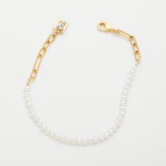 Delicate fresh water pearls and a pretty, rope-textured chain are a timeless combination. Perfect for stacking and adding charms--either one between the pearls, or several along the chain. Materials: 6.75-7.75" Overall Gold-Plated Brass Lobster Clasp Closure Genuine fresh water pearls Classic White Chain Bracelet With Pearl Drop, Classic White Pearl Chain Bracelet, Elegant Charm Bracelet With Pearl And Round Beads, White Pearl Bracelet With Adjustable Chain, Classic Adjustable Chain Bracelet With Pearl Charm, Delicate Baroque Pearl Bracelet With Pearl Chain, Elegant Beaded Bracelets With Chain And Round Beads, Elegant Beaded Bracelets With Round Beads And Chain, Elegant Beaded Bracelets With Chain