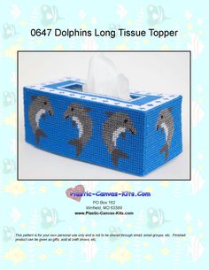 a blue tissue box with dolphins on it and the words dolphins long tissue topper