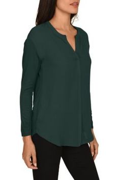 The Taylor blouse is a timeless top that will be your all time favorite. The simple silohuette paired with the bold colors can be dressed up or down to match any occasion. | DR2 by Daniel Rainn Women's Split Neck Casual Top, Large Fitted Tops With Shirttail Hem For Workwear, Fitted Shirttail Hem Tops For Daywear, Trendy Long Sleeve Top For Work, Trendy Solid Color Long Sleeve Top For Work, Trendy Solid Long Sleeve Top For Work, Green Shirttail Hem Top For Fall, Classic Green V-neck Top, Green Tops With Shirttail Hem For Fall, Versatile Shirttail Hem Top For Workwear