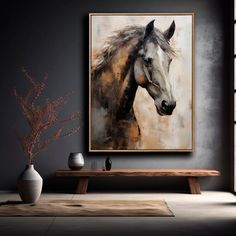 a painting of a horse is hanging on the wall above a table with vases