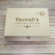 a wooden box that says hannah's christmas eve box