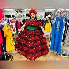 The Beautiful Chiapaneca Dress Is A Masterpiece From The Chiapas Artisans! Fully Handmade With Vivid Floral Cotton Embroidery, It's A Favorite For Mexican Fiestas! The Campesina Off The Shoulder Top Is Made With A Shoulder Adjustable String. The Skirt Is Also Adjustable To Most Sizes. The Embroidery Covers The Entire Skirt And Blouse, Back And Front. Please Note That This Is The Fiesta Version And It's Not Suitable For Professional Dancers. We Carry Another Set With A Double Width Skirt For Folk Traditional Black Fiesta Dress, Traditional Black Dress For Fiesta, Blouse Back, Silk Dresses, Mexican Dresses, Professional Dancers, Skirt And Blouse, Cotton Embroidery, Off The Shoulder Top