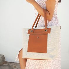 "The new Avery model is handmade with the highest delicacy and craftsmanship. It is perfect for any time, especially in summer. An ideal bag to take to the beach or to go to the market. It is large enough to fit a towel and beach items, as well as all the accessories a woman needs to carry in her handbag on a daily life. Our Avery is a tote basket with handles and details in high quality leather, an exterior and an interior pocket and a metal clasp. In addition, it has a base made of leather to Everyday Beige Leather Straw Bag, Cream Leather Bags For Vacation, Summer Leather Pouch Shoulder Bag, Eco-friendly Leather Shoulder Bag For Everyday, Versatile Natural Color Beach Bag For Everyday, Versatile Everyday Beach Bag In Natural Color, Elegant Brown Beach Bag For Everyday Use, Beige Leather Beach Bag For Travel, Leather Shoulder Bag With Removable Pouch For Vacation