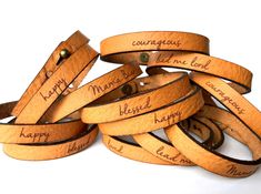 "Taking a short break to enjoy time with family. Our shop remains open with processing times extended. Thank you! Be Inspired all Day. Jewelry with meaning. Skinny Full Grain Leather Bracelet with Engraved with wording of your choice (no profanity). Makes a wonderful gift reminder to someone you love! Simply add the wording in the personalization box, be sure to check spelling. This Classic style Leather Bracelet is perfect for stacking with each other or any bracelet! Made from Full Grain Leath Leather Stamped Bracelet, Bracelet Valentines, Custom Engraved Bracelet, Cnc Ideas, Engraving Ideas, Button Studs, Message Bracelet, Word Bracelet, Anchor Bracelet