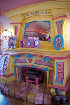 a brightly colored fireplace in the middle of a room