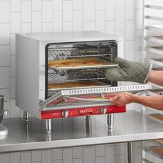 Cost-effective and versatile, this Avantco CO-28M countertop convection oven is great for supplemental baking, low-volume baking, and medium-volume reheating at coffee shops, kiosks, churches, and schools. Its half size cavity can handle up to (4) half size 13" x 18" sheet pans while its compact design is great for small footprint and countertop needs with a recommended approximate usage of 4 hours per day, 5 days per week. Note: this unit is not intended for high-volume, high-temperature, or de Restaurant Kitchen Design, Tent Ideas, Countertop Convection Oven, Commercial Ovens, Small Oven, Sheet Pans, Countertop Surfaces, Easy Oven, Home Bakery